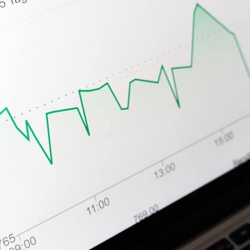 hands-holding-microphones-and-phone Stock market graph